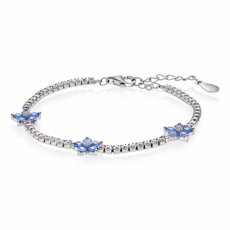 Armbånd i rhodinert sølv med blanke og lyseblå cubic zirconia